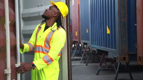 Technicians inspect container repairs by welding Stock Footage 308815992