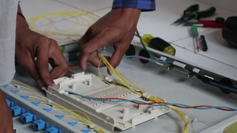 Technicians install fiber optic cables Видео 342909477