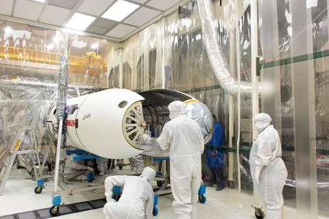 Technicians install the Northrop Grumman Pegasus XL payload fairings aroun... 스톡 사진