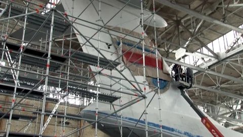 Technicians perform maintenance on keel Il-76 aircraft.at high altitude. Video stock 108866417