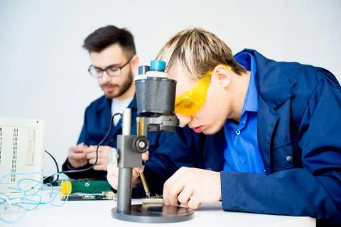Technicians repairing computers Stock Photos