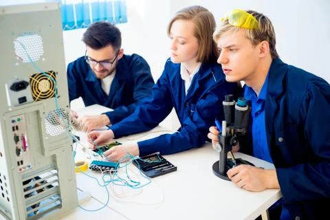 Technicians repairing computers Stock Photos