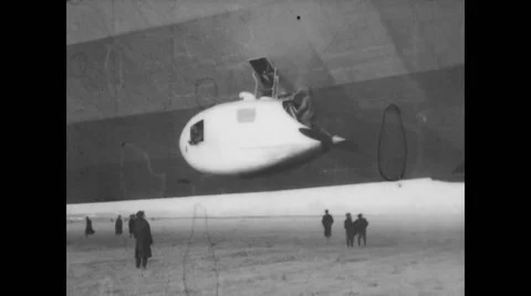 Technicians repairing engine of USS Los Angeles airship Stock Footage