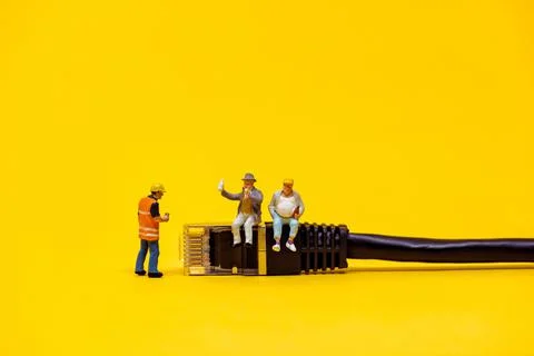 Technicians resting and talking during break Stock Photos