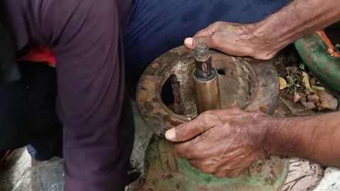 Technicians Sorting Metallic Fasteners from a clear plastic bag to repair a disa Stock Footage 344850614