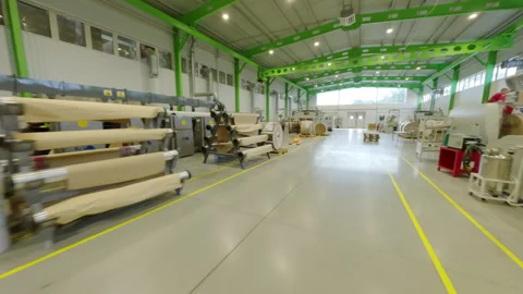 Technicians use extensive equipment producing packaging FPV Stock Footage 291337153