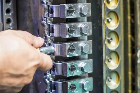 Technicians use plug gauges to inspect workpiece  on CNC Stock Photos