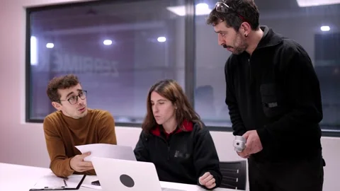 Technicians using the laptop in a modern CNC factory office Stock Footage 262107840