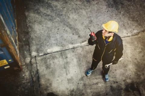 Technicians work with field radios and teamwork. Stock Photos