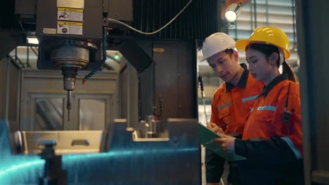 Technicians at Work in Industrial Unit 스톡 동영상 330939546