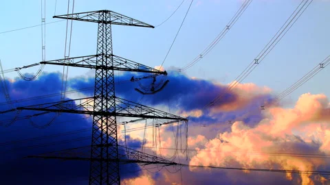 Technicians work roped up and secured to a high voltage line on a power pole Video stock 163084801