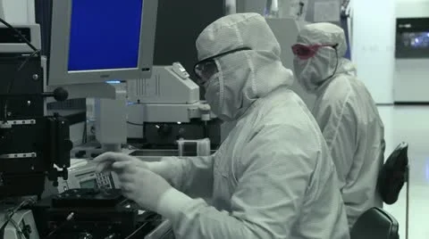 Technicians Working in Clean Lab Stock Footage 22775010