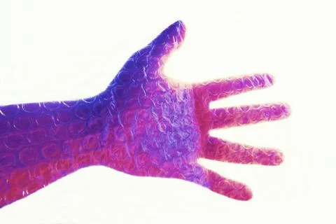 Technicolor hand in bubble wrap Stock Photos