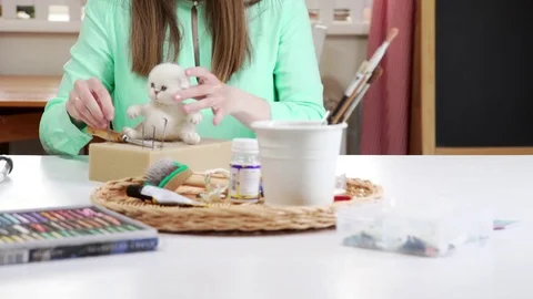 Technique of dry felting from felt: the process of creating cute toys Stock Footage 79445699