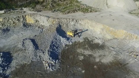 Technique in a granite quarry. the camera is moving backwards Stock Footage 82668969