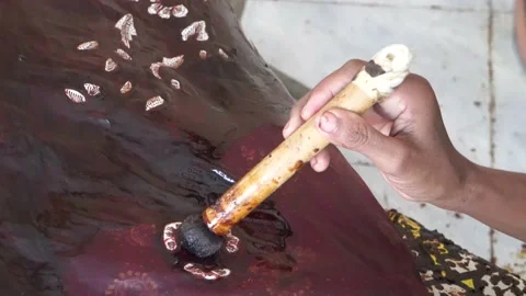 The technique of making batik by writing using a canting tool. Stock Footage 169934641