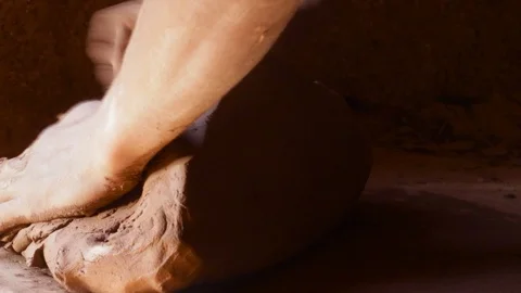 The technique of mixing the clay dough with hands  Stock Footage 124591936