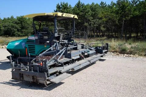 Techniques for construction of the road. Asphalt dispenser. Stock Photos