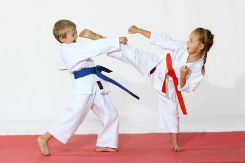 Techniques of self-defense bout boy and girl Stock Photos