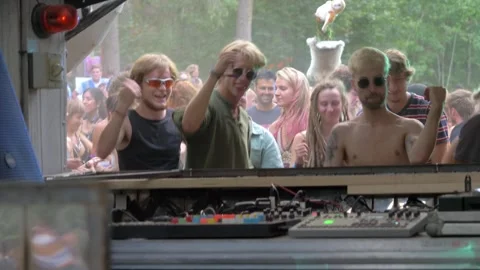 Techno Dance Rave: Energetic Crowd Grooving Stock Footage 253040686