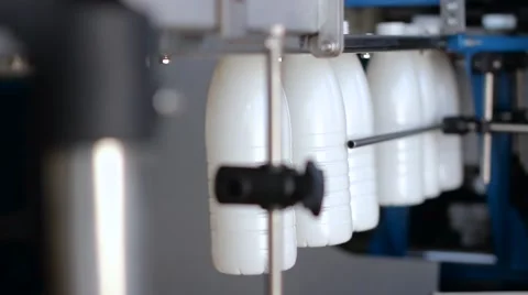 Technolofy of conveyor with milk bottles Stock Footage 58756695