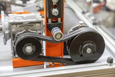 Technological assembly featuring belt pulleys, robust metal frame, vibrant .. Stock Photos