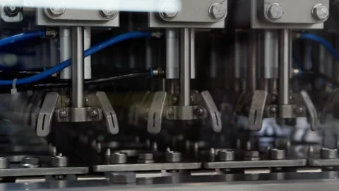 Technological background with automatic production machine. Stock Footage 156981538