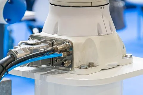 Technological component with robotic bracket, white cylindrical body mounte.. Stock Photos