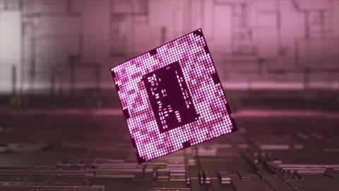 Technological concept. The large chip rotates and glows in neon pink and yellow Stock Footage 242264252