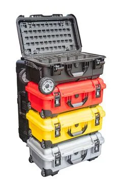 Technological concept on white background, stack of four wheeled cases, foam  Stock Photos