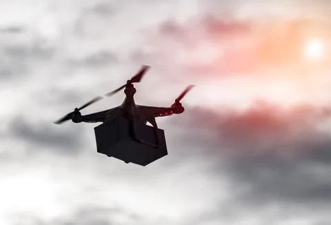 Technological delivery innovation - fast drone delivery concept above town Stock Photos