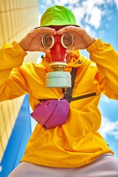 Technological disaster concept, air pollution. Portrait of a man in bright co Stock Photos