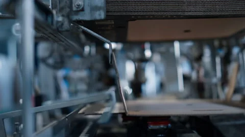 Technological factory cardbox production machine working tech process close up Stock Footage 169866792