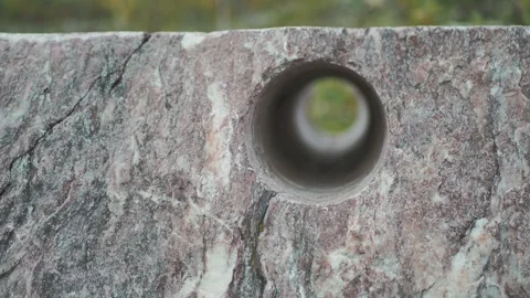 A technological hole drilled through an old marble block. Stock Footage 322118721