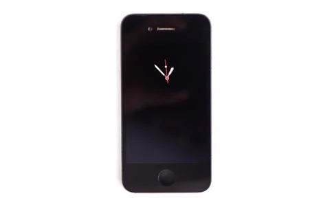 Technological innovation concept: phone with clock hands on the screen, short Stock Photos