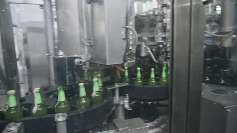 Technological line for beer bottling at the brewery. Technological process of Vidéo 151887601