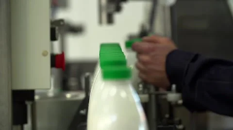 Technological line of spill of yogurt. close up shot of bottles Video stock 58328080