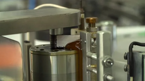 Technological line of spill of yogurt. close-up shot of a sticker of labels Stock-Footage 58328478