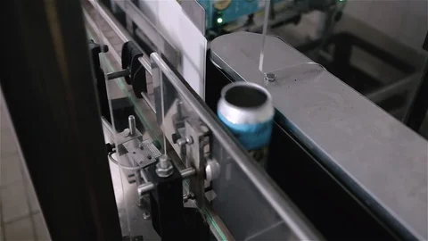 Technological line for sticking information labels on beer bottles in brewery Vídeo Stock 129306378