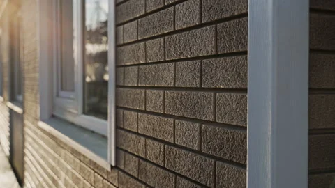 Technological modern building material for facing the walls of buildings Stock Footage 168005500