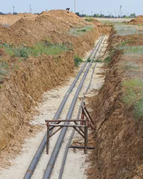 Technological pipelines DN50 and DN 150 make a turn by means of bends in the  Stock Photos