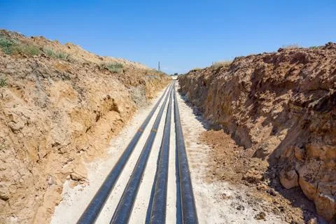 Technological pipelines DN50 and DN 150 make a turn by means of bends in the  Stock Photos