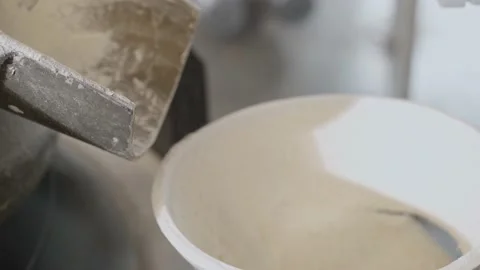 Technological process of product molding. The dough from the dough rounder Stock Footage 229693150