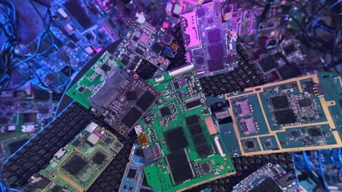 Technological rotating surface with used microchips motherboards Stock Footage 271368224