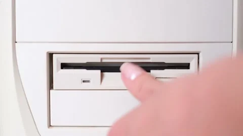 Technologies of the 90s. Floppy disk in the system unit. Stock Footage 203934994