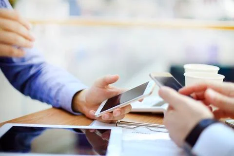 Technologies make life easier. Close-up of man holding digital tablet while Stock Photos