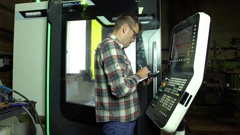 Technologist adjusts the milling machine 4k. Stock Footage 77827866