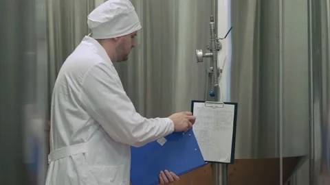 Technologist at a beer factory Stock Footage 158263103