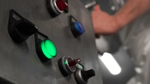 The technologist turns the handle of the milk supply valve on the metal cistern Stock Footage 145353278