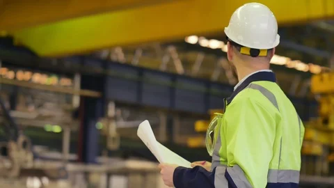 Technologist wearing hardhat and protective uniform Stock Footage 106570569